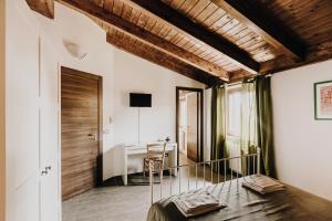 TV a/nebo společenská místnost v ubytování B&b La Cicala