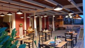 A restaurant or other place to eat at Bio Agriturismo Valle dei Calanchi