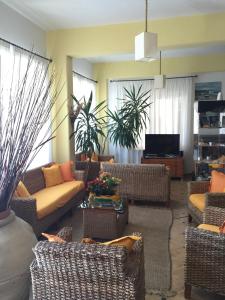 TV a/nebo společenská místnost v ubytování Hotel Ortensia