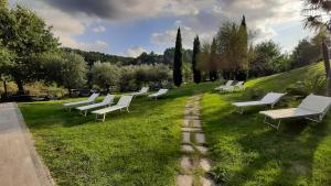 A garden outside Bio Agriturismo Valle dei Calanchi