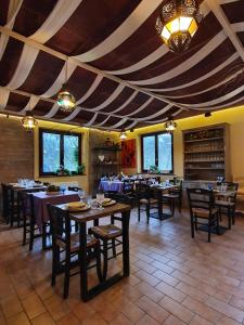 A restaurant or other place to eat at Bio Agriturismo Valle dei Calanchi