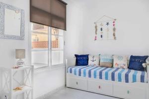 Postel nebo postele na pokoji v ubytování Villa Nora Beach + 16 fotografií