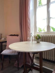 Posezení v ubytování Logis Relais de la Source