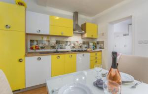 Kuchyň nebo kuchyňský kout v ubytování Apartmani Cupar