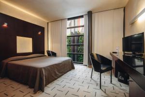 TV a/nebo společenská místnost v ubytování DelleArti Design Hotel
