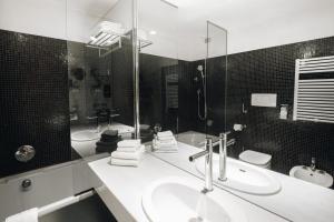 Koupelna v ubytování DelleArti Design Hotel