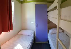 Postel nebo postele na pokoji v ubytování Camping Fossa Lupara