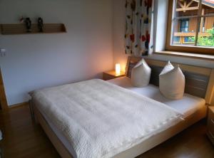 Posteľ alebo postele v izbe v ubytovaní Ferienwohnung Prosch
