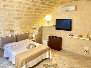 Postel nebo postele na pokoji v ubytování Suite Arco 166 Stanza privata