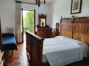 Postel nebo postele na pokoji v ubytování Hotel Madonna di Luciago