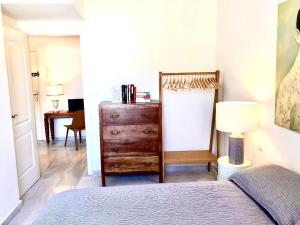 A bed or beds in a room at Inspiring Apartment in Carihuela Beach Még 2 kép