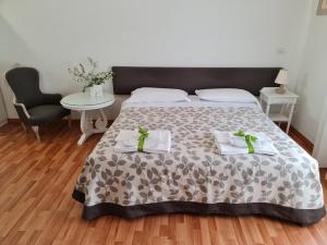 Posteľ alebo postele v izbe v ubytovaní Residence Ancona