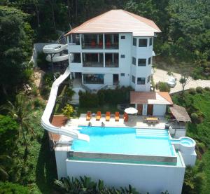 an aerial view of a house with a swimming pool at Villa Lulu Koh Samui in Mae Nam