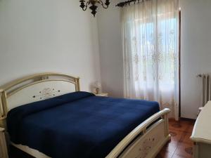 Postel nebo postele na pokoji v ubytování Hotel Madonna di Luciago