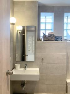 Et badeværelse på Aelia Living