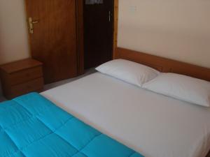 A bed or beds in a room at Zavrakli