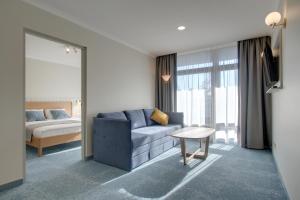 Postel nebo postele na pokoji v ubytování Marine Hotel Jūrmala