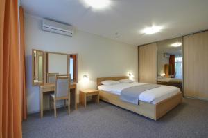 Postel nebo postele na pokoji v ubytování Marine Hotel Jūrmala