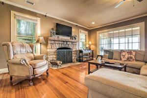 a living room with a couch and a fireplace at Cloudland Retreat with Mountain and Valley Views! in Menlo