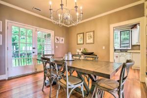 a dining room with a large wooden table and chairs at Cloudland Retreat with Mountain and Valley Views! in Menlo