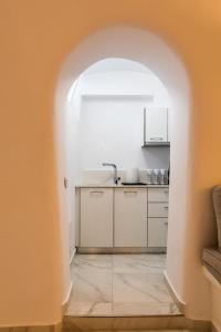 Kuchyň nebo kuchyňský kout v ubytování Santorini Delux