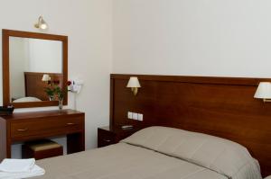 Postel nebo postele na pokoji v ubytování Hotel El Greco