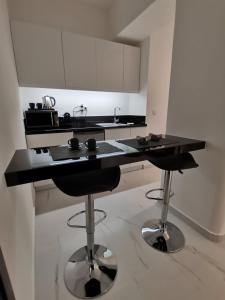 Kuchyňa alebo kuchynka v ubytovaní The Syntagma Luxury Suite