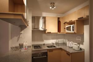 Köök või kööginurk majutusasutuses Alto Sporting Apartments +14 fotot