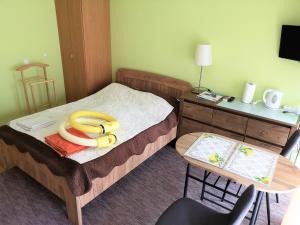 Posteľ alebo postele v izbe v ubytovaní Villa Viktoria