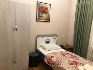Voodi või voodid majutusasutuse Arm Hotel toas
