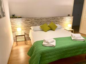 Postel nebo postele na pokoji v ubytování B&B Leader