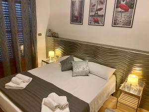 Postel nebo postele na pokoji v ubytování B&B Leader