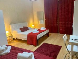 Postel nebo postele na pokoji v ubytování B&B Leader