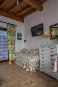 Posteľ alebo postele v izbe v ubytovaní B&B Etruscan Garden