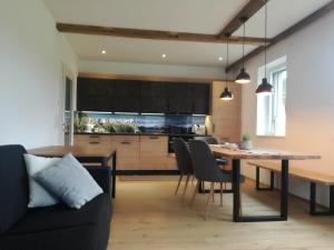 Posedenie v ubytovaní Appartement Ferienwohnung Bergahorn Gröbming