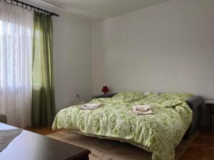 Postelja oz. postelje v sobi nastanitve apartman Mara