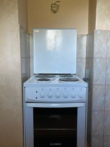 Kuhinja oz. manjša kuhinja v nastanitvi apartman Mara