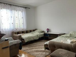 Postelja oz. postelje v sobi nastanitve apartman Mara