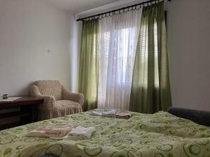 Postelja oz. postelje v sobi nastanitve apartman Mara