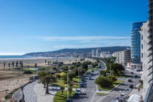 a view of a beach from a building at Acqua House by Rent4All in Figueira da Foz