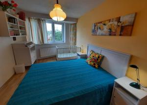 Postel nebo postele na pokoji v ubytování Apartmán Lesná + 4 fotografie
