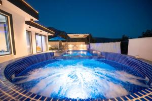 Kép Tarhan 2 - 1 Bedroom with 2 jacuzzi in Kalkan szállásáról Çavdır városában a galériában