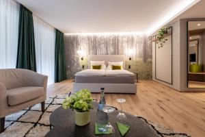 Postel nebo postele na pokoji v ubytování Sackmann Genuss und Spa Resort + 37 fotografií