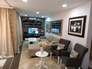 TV a/nebo společenská místnost v ubytování Guest House Maja