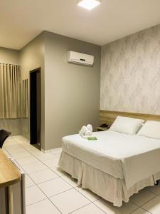 Postel nebo postele na pokoji v ubytování Hotel Mandino + 37 fotografií