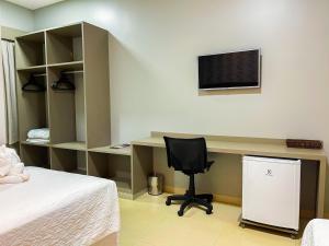Postel nebo postele na pokoji v ubytování Hotel Mandino