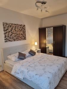 Postel nebo postele na pokoji v ubytování Luxury Apartment Nuneni