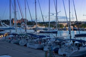 a bunch of boats docked in a harbor at Hotel Hermes in Rhodes Town