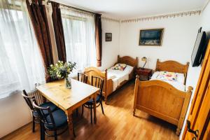 Postel nebo postele na pokoji v ubytování Pension Fialka