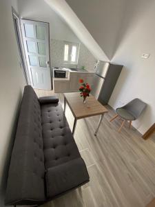 A seating area at Ninemia Apartment